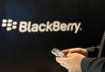 A man holds a BlackBerry in this file photo. THE CANADIAN PRESS/AP-Berthold Stadler
