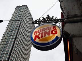 A sign hangs at a branch of Burger King in central London, Thursday, Jan. 24, 2013. Burger King says it has stopped buying beef from an Irish supplier whose patties in Britain and Ireland were found to contain traces of horsemeat. Officials say there is no risk to human health, but the episode has raised food security concerns. (AP Photo/Kirsty Wigglesworth)