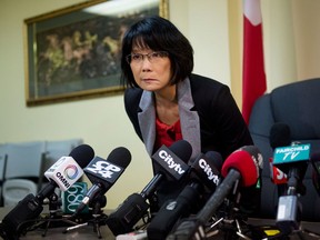 NDP MP Olivia Chow announces that she has been diagnosed with Ramsay Hunt syndrome during a press conference at her constituency office in Toronto Friday, January 4, 2013. The virus has affected the left side of Chow's face, making it difficult for her to smile, laugh, and wear contact lenses.  (Darren Calabrese/National Post)