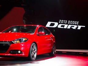 In this Monday, Jan. 9, 2012, file photo, the 2013 Dodge Dart is unveiled at the North American International Auto Show, in Detroit, Mich. The Dart, unveiled with much fanfare at last year’s Detroit auto show, got off to a slow start after going on sale in May 2012. Only 25,000 have sold, which CEO Sergio Marchionne concedes is short of his expectations. (AP Photo/Tony Ding, file)