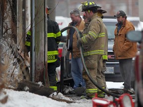 Windsor Fire and Rescue was on scene at Windsor Body and Fender at 1850 University Ave. W., Saturday, January 5, 2013, where a representative of the Ontario Fire Marshall is investigating a fire that occurred early morning Friday.  (DAX MELMER / The Windsor Star)