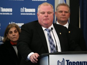 Toronto Mayor Rob Ford appears in front of the media in Toronto on Friday, January 25, 2013, after learning that he has successfully appealed a decision to remove him from office following a conflict of interest hearing. THE CANADIAN PRESS/Chris Young