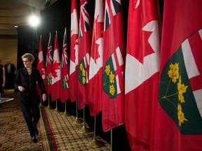 Kathleen Wynne, soon-to-be 25th Premier of Ontario, arrives at her first press conference as Ontario Liberal leader, Jan. 27, 2013. (Nathan Denette / Canadian Press)