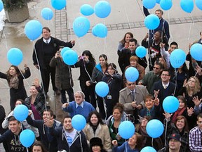 St. Clair College students braved one of the coldest days of the year Wednesday to release 100 blue balloons into the sky in the bid drive away the winter blues.