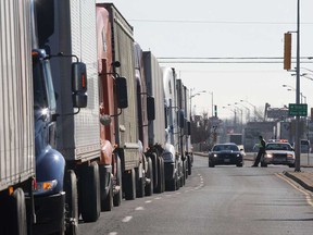 File photo of trucks on Huron Church Road in Windsor, Ont. (DAN JANISSE/The Windsor Star)