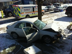 A car slammed into a recycling truck in the 900 block of Josephine Avenue. (Dan Janisse/The Windsor Star)
