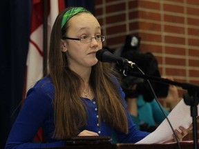 Sarah Lewis, 12, speaks to the crowd at Central Public School in Windsor, Ont., after receiving her Queen's 60th Anniversary Diamond Jubilee medal from MP Brian Masse, Monday, January 21, 2013.  (DAX MELMER / The Windsor Star)