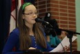 Sarah Lewis, 12, speaks to the crowd at Central Public School in Windsor, Ont., after receiving her Queen's 60th Anniversary Diamond Jubilee medal from MP Brian Masse, Monday, January 21, 2013.  (DAX MELMER / The Windsor Star)