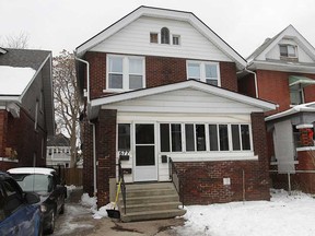 A duplex at 677 Moy Ave. is shown Tuesday, Jan 1, 2013 in Windsor, Ont. A man was stabbed at a New Year's Eve party and suffered serious injuries. (DAN JANISSE/The Windsor Star)