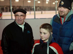 Patrick McCloskey, 10, centre, who is happy the NHL ending to lockout, discusses the issue with his grandfather, Ernie Lira, left, and his father, Randy McCloskey while at Forest Glade Arena in Windsor, Ont., Sunday, January 6, 2013.  (DAX MELMER / The Windsor Star)