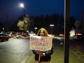 Jackie Horkachuck of Newtown stands outside Newtown High School as Connecticut state politicians and members of the community gather for Connecticut's Bipartisan Task Force on Gun Violence Prevention and Children's Safety, on January 30, 2013 in Newtown, Connecticut. The task force was created in response to the shooting at Sandy Hook Elementary School that took the lives of 20 first graders and six staff members on December 14. The taskforce heard testimony from local officials, first responders and families of the Sandy Hook Elementary system. (Photo by Christopher Capozziello/Getty Images)
