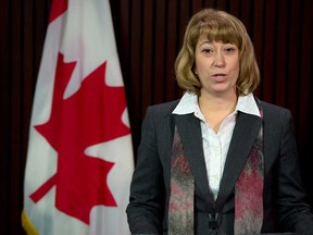 In this file photo, Ontario Education Minister Laurel Broten speaks to reporters in Toronto on Thursday, Jan. 3, 2013. Broten has said she will resign the position as of July 2. (THE CANADIAN PRESS/Frank Gunn)