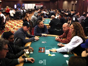 In this photo taken Saturday, Jan. 19, 2013, Recruits play poker during the MBA Poker Championship and Recruitment Weekend at Planet Hollywood in Las Vegas.(AP Photo/Las Vegas Sun, Leila Navidi)