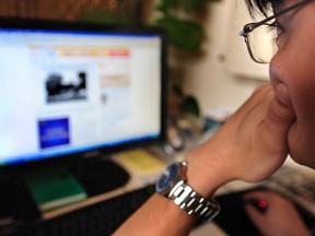 A man surfs the web in this file photo. (Frederic J. Brown/AFP/Getty Images)