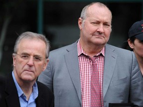 In this file photo, Actor Randy Quaid, centre, wife Evi, right, and supporter Terry David Mulligan talk to reporters in Vancouver, BC Wednesday, February 23, 2011.   Canadian immigration officials have denied U.S. actor Randy Quaid's request for permanent resident status in Canada, a Canadian government official confirmed late Saturday, Jan. 26, 2013. The official spoke on condition of anonymity because they were not authorized to speak publicly.   (Jason Payne/ PNG)