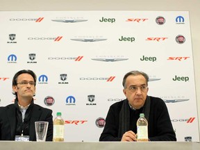 Sergio Marchionne, right, CEO of Chrysler Group LLC, and Richard Palmer, chief financial officer of Chrysler Group LLC, speak with media at the North American International Auto Show at Cobo Hall in Detroit  Monday, January 14, 2013.  (DAX MELMER / The Windsor Star)