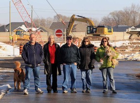 Grosvenor Drive residents Brian Hopson, left, Linda Hopson,  Tom Robert, Diane Pastorius and Andrea Barrette near the Rt. Hon. Herb Gray Parkway in LaSalle, Ontario on January 9, 2013. (JASON KRYK/ The Windsor Star)