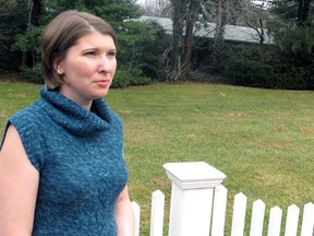 Katie Beers, whose kidnapping attracted nationwide headlines in 1992, poses for a photo on Monday, Jan. 14, 2013, in Old Westbury, N.Y. The 30-year-old mother of two has co-written a new book about her ordeal to mark the 20th anniversary of her release. She says she had been the victim of sexual abuse by a family acquaintance before being kept in a dungeon by another family friend for 17 days. (AP Photo/Frank Eltman)