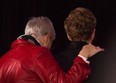 Kathleen Wynne, right, and her partner Jane Rounthwaite leave the stage after celebrating her victory and being the first women Premier at the Ontario Liberal Leadership convention in Toronto on Saturday, January 26, 2013. THE CANADIAN PRESS/Nathan Denette