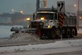 Snow plow leaves the City of Windsor Crawford Yard during a heavy snowfall. (Windsor Star files)