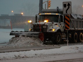 Snow plow leaves the City of Windsor Crawford Yard during a heavy snowfall. (Windsor Star files)