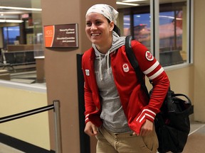 Windsor's Mary Spencer is greeted by fans and supporters as she arrives at the airport in Windsor after competing in the Olympics in London.  (The Windsor Star/TYLER BROWNBRIDGE)