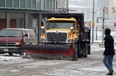 City of Windsor snow plow and salter heads south on Ferry Street from Riverside Drive West. (Windsor Star files)