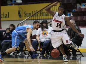 Windsor's Stefan Bonneau, right, is guarded by Halifax's Tyler Richards at the WFCU Centre. (DAN JANISSE/The Windsor Star)