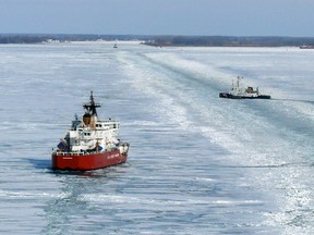 The U.S. Coast Guard Cutters Mackinaw and Neah Bay break track lines for a commercial vessels in Lake St. Clair, Jan. 12, 2010.