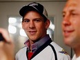 Spitfires defenceman Pat Sieloff, left, is introduced to the media by GM Warren Rychel June 19, 2012.  (NICK BRANCACCIO/The Windsor Star)