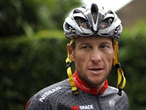 Lance Armstrong arrives to participate in a training session during the second of the two rest days of the 2010 Tour de France cycling race at the hotel hosting the US cycling team on July 21, 2010 in Pau, Southwestern France. (NATHALIE MAGNIEZ/AFP/Getty Images)