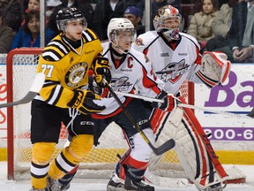 Sarnia's Anthony DeAngelo, from left, looks for a rebound against Windsor's Saverio Posa and Jordan DeKort Friday in Sarnia. (Metcalfe photography)