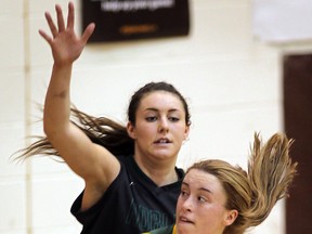 Belle River's Andie Suthers, left, covers Havergal's Madison Coville in OFSSA AAA girls basketball in Essex. (NICK BRANCACCIO/The Windsor Star)