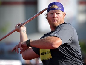 Windsor's Scott Russell throws the javelin in the men's final event at the Canadian Track and Field Championships in Calgary last year. (THE CANADIAN PRESS/Sean Kilpatrick)