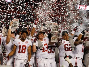 Alabama players celebrate after the BCS National Championship college football game against Notre Dame Monday, Jan. 7, 2013, in Miami. Alabama won 42-14. (AP Photo/Wilfredo Lee)