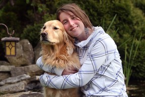 File photo of Arielle Grondin with her dog at her Tecumseh home in May 2011. (DAN JANISSE/The Windsor Star)