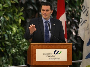 The University of Windsor has signed an agreement with Ottawa to collaborate with a Federal research laboratory to help develop lighter and more fuel efficient  materials  for automotive manufacturing. Jeff Watson, Conservative MP for Essex, was on hand Thursday, Jan. 10, 2013, at the school to make the announcement.  (DAN JANISSE/The Windsor Star)