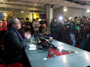 Renee Claude Menard, Senior Director, public relations, corporate division at Cirque Du Soleil speaks to reporters at the Cirque headquarters in Montreal, Wednesday, January 16, 2012, at a time when the company announced up to 400 layoffs. THE CANADIAN PRESS/Graham Hughes.