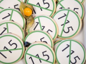 Cookies bearing an anti Bill 115 logo stand on a plate as Sam Hammond, president of the Elementary Teachers Federation of Ontario (ETFO) attends a news conference in Toronto on Friday, December 21, 2012. (THE CANADIAN PRESS/Chris Young )