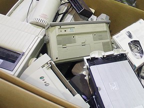 A box full of e-waste is shown in the Computers For Kids warehouse in Windsor, Ont. in this 2010 file photo. (Tyler Brownbridge / The Windsor Star)