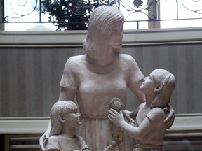 A statue of a mother and two children that sits in the lobby of the Gates of Glengarda luxury condominium development is shown Tuesday, Jan. 29, 2013, in Windsor, Ont. The statue commissioned by developer Chuck Mady is the subject controversy as the condo board is seeking to have it removed.(DAN JANISSE/The Windsor Star)