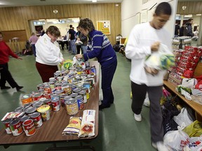 File photo of Herman high school students helping out with a human food transportation chain in Dec. 2009 at nearby Peace Lutheran Church in Windsor. (Windsor Star files)