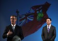 In this file photo, Dave Brister, left,  joins Ontario Progressive Conservative Leader TIm Hudak as he delivers his When The Money Runs Out presentation at the Canadian Transportation Museum in Essex on Thursday, January 17, 2013. (Windsor Star files)