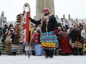 Native dancers rally during an 'Idle No More' gathering on Parliament Hill in Ottawa on Monday, Jan. 28, 2013. THE CANADIAN PRESS/Sean Kilpatrick