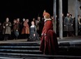 In this photo provided by the Metropolitan Opera,  Elza van den Heever, center right, sings the role of  Elisabetta with Joyce DiDonato, center left, in the title role during a dress rehearsal of Donizetti's "Maria Stuarda," at the Metropolitan Opera in New York. (AP Photo/Metropolitan Opera, Ken Howard)