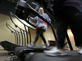 People on treadmills at a gym for better fitness. (Associated Press photo)