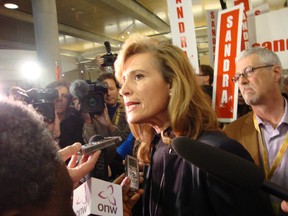 OLP leadership candidate Sandra Pupatello is questioned by media at the leadership convention site on Jan. 25, 2013. (Dalson Chen / The Windsor Star)