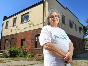 Mary Ann Cuderman chair of Olde Sandwich Towne BIA poses July 11, 2012, in front of the Sandwich Fire Hall No. 6 at 363 Mill St. in Windsor. (Windsor Star files)