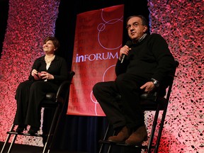 Sergio Marchionne, chairman and CEO, Chrysler Group LLC and CEO, Fiat S.p.A., is joined on stage by Rebecca Lindland (left) after delivering the keynote address at Inforum's 11th Annual Auto Show Breakfast at the Renaissance Centre in Detroit, Michigan on Friday, January 18, 2013.  (TYLER BROWNBRIDGE / The Windsor Star)
