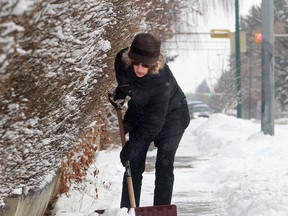 Chiropractors say choosing the proper snow shovel can help you avoid straining your back muscles. (Ted Rhodes / Postmedia News files)